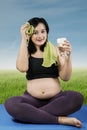 Healthy pregnant woman drinks water Royalty Free Stock Photo