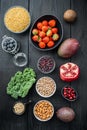 Healthy products immunity boosters , flat lay, on black wooden background