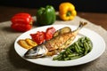 Healthy and proper food, grilled fish and vegetables Royalty Free Stock Photo