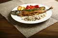 Healthy and proper food, grilled fish and vegetables Royalty Free Stock Photo