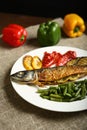 Healthy and proper food, grilled fish and vegetables Royalty Free Stock Photo