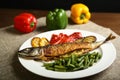 Healthy and proper food, grilled fish and vegetables Royalty Free Stock Photo