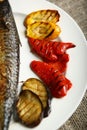 Healthy and proper food, grilled fish and vegetables Royalty Free Stock Photo