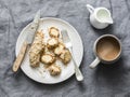 Healthy protein snack, breakfast - peanut butter, seeds, banana nut bites on a grey background, top view