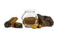 Healthy pure wild natural chaga mushroom Inonotus obliquus powder in glass jar.