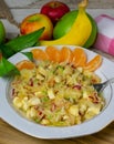 Healthy rasped fruit salad with apples