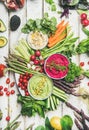 Healthy raw summer vegan snack plate over white table background