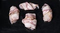 Fresh monkfish tray with bacon for a chef`s recipe