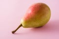 Healthy fresh pear on pink background Royalty Free Stock Photo