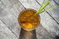 Healthy, refreshing drink of cinnamon and stalks of lemongrass on a wooden table, top view Royalty Free Stock Photo