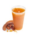 Cold and refreshing tamarind drink on a white background