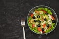 Healthy salad in a bowl with olives, tomato, cheese, microgreens and avocado served for breakfast. healthy, delicious Royalty Free Stock Photo