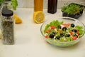 Healthy salad in a bowl with olives, tomato, cheese, microgreens and avocado served for breakfast. healthy, delicious Royalty Free Stock Photo