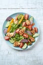 Healthy Salad with Chicken Breast, Cherry Tomatoes, Cucumber, Orange Pepper, Endive and Red Onion. Royalty Free Stock Photo