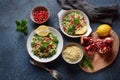 Healthy salad with couscous, fresh mint, cucumber, pomegranate, lemon and olive oil.