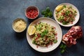 Healthy salad with couscous, fresh mint, cucumber, pomegranate, lemon and olive oil.