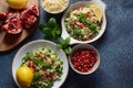 Healthy salad with couscous, fresh mint, cucumber, pomegranate, lemon and olive oil.