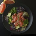 Healthy salad grapefruit and green leaves. Deliciouse dietary food. lose weigh. Square iamge, top view.