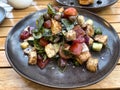 Healthy salad made of bell pepper, tomato, bread, spinach, and cucumber Royalty Free Stock Photo