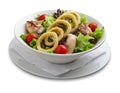 Healthy salad with onion rings and grilled chiken