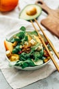 Healthy salad with persimmon, arugula, Royalty Free Stock Photo