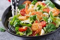 Healthy salad plate. Fresh seafood recipe. Grilled shrimps and fresh vegetable salad and egg. Grilled prawns. Royalty Free Stock Photo