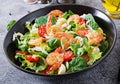 Healthy salad plate. Fresh seafood recipe. Grilled shrimps and fresh vegetable salad and egg. Grilled prawns. Royalty Free Stock Photo