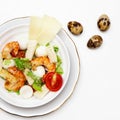 Healthy salad plate. Fresh seafood recipe. Grilled shrimps and fresh vegetable salad and egg. Grilled prawns Royalty Free Stock Photo