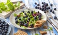 Healthy salad with rocket and blueberries Royalty Free Stock Photo