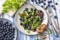 Healthy salad with rocket and blueberries Royalty Free Stock Photo