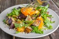 Healthy salad of vegetables - tomatoes, arugula, eggplant