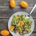 Healthy salad of vegetables - tomatoes, arugula, eggplant