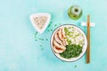 Healthy salad in a white bowl, chopsticks. Chicken rolls, rice, chuka and green onion. Royalty Free Stock Photo