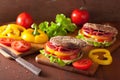 Healthy sandwich with salami tomato pepper and lettuce Royalty Free Stock Photo