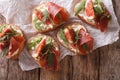 Healthy sandwiches with figs, prosciutto, arugula and cheese clo