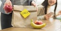 Healthy School Lunch. Mother Packing Food For Daughter Royalty Free Stock Photo