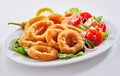 Healthy seafood appetizer of squid and Greek salad