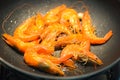 Healthy seafood cooking shrimp on wok