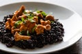 Seared girolles mushrooms with black rice Royalty Free Stock Photo