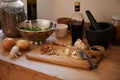 A healthy selection of ingredients for salad. a variety of vegetables and ingredients on a cutting board.