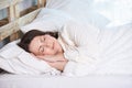 Healthy sleep. Young girl. White bed