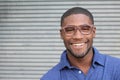 Healthy Smile. Teeth Whitening. Beautiful Smiling Young man Portrait close up. Over modern gray background . Laughing businessman Royalty Free Stock Photo