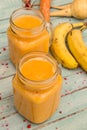 Healthy smoothie with mango, banana, carrot and parsnip