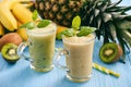 Healthy smoothie with pineaple, kiwi fruit and bananas. Royalty Free Stock Photo