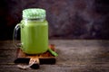 Healthy smoothies in mason jar from spinach, cucumber, celery, apple, parsley with olive oil, Himalayan rose salt and mineral wate Royalty Free Stock Photo