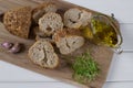 Healthy snack. Cereals bread, olive oil with herb spicy and garlic. Fresh cress salad.