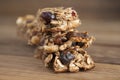 Healthy snack. Close up cereal granola bars with nuts, dried fruits, bannana, honey and oat meal. Isolated. Royalty Free Stock Photo