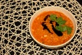 Healthy snack - Dense Lentil soup with tomatoes and carrot