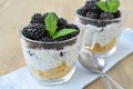 A healthy snack. Desert. Fresh fruit with yogurt in a bowl.