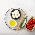 Healthy snack: mouth-watering kebabs on a picnic with tomatoes, mozzarella, salami, black olives, Basil, tortellini Royalty Free Stock Photo